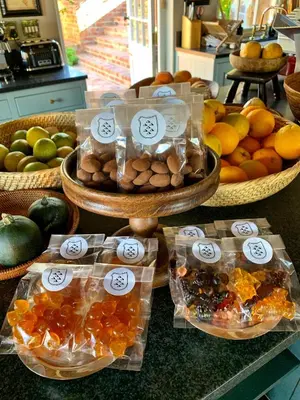 a bunch of fruits in plastic bags on a counter at 7 Koppies in Franschhoek