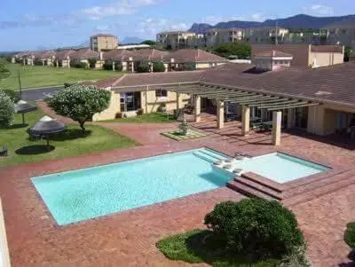 an overhead view of a house with a swimming pool at 176 hbc in Hermanus