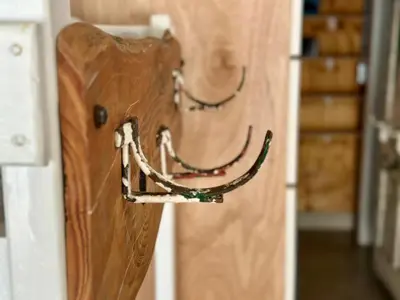 a wooden door with two chains on it at the STUDIO apartment in Durbanville in Durbanville