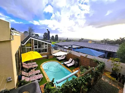 an overhead view of a backyard with a swimming pool at Walters Lane Luxury Accommodation main house - No loadshedding in Cape Town