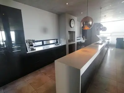 a kitchen with a large counter in a room at Stellar Guest Villa on Stunning Wine Farm in Cape Town