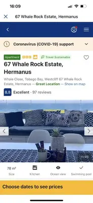 a page of a website with a bed and a couch at 67 Whale Rock Estate, Hermanus in Hermanus