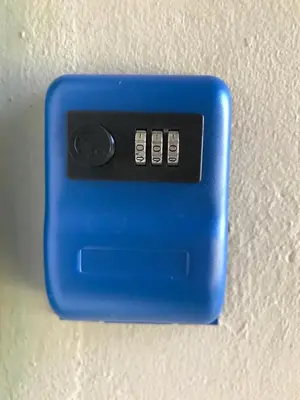 a blue electrical outlet on a wall at Kleine Vrede Farm Cottage in Hermanus