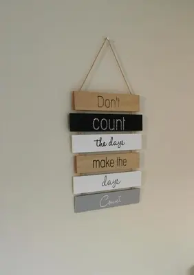a sign that says dont count the days make the days at Jasmine Cottage - Fast Wi-Fi, slow living in Hermanus