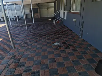 a hallway of a building with a checkered floor at Hasate Guest House 10 Florence street Oakdale Belliville 7530 cape town south African in Cape Town