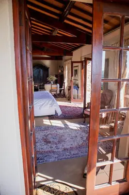 a view of a bedroom with a bed through a door at Casa Mori House in Stellenbosch