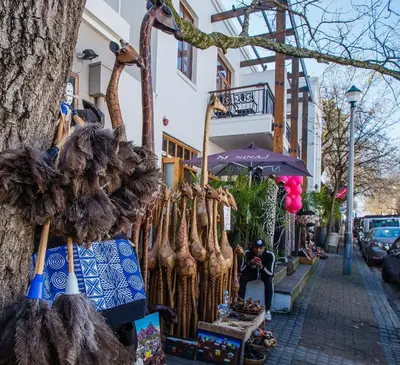 a street with a store with a bunch of animal skeletons at Casa Bella Stellenbosch - Jan Cats No 4 in Stellenbosch