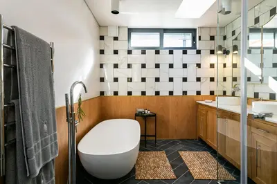 a bathroom with a toilet and a sink and a tub at Bosjes - Herehuis in Breerivier