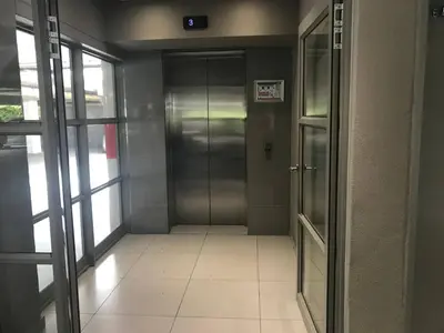 a hallway with an elevator in a building at Century City Luxury Two Bedroom Apartment in Cape Town
