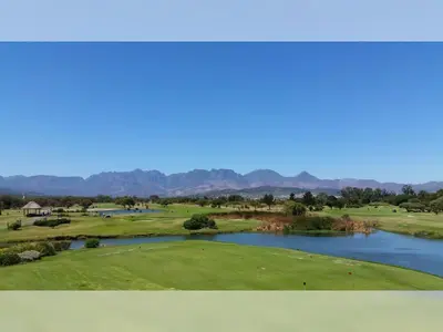 a view of a golf course with a river at Hibernian Towers 807, Beach Road, Strand in Strand