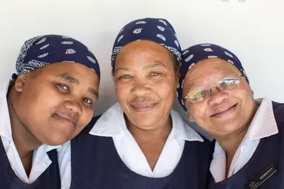 a group of three people posing for a picture at Klein Welmoed Luxury Guest House in Stellenbosch
