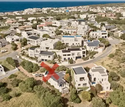 an aerial view of a residential neighborhood with houses at Hemel-en-See Beach House in Hermanus