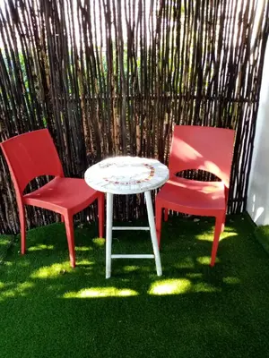 two chairs and a table and a table and two chairs at 33onGill in Cape Town