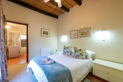 a bedroom with a bed in a room at GreyCot in Greyton