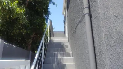a stairway leading up to a building at Hayley's Place in Cape Town