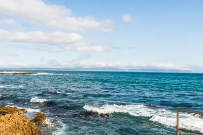 a view of the ocean from the shore at Bayview 203 in Hermanus