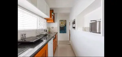 a kitchen with a sink and a counter top at Antilles on Beach in Cape Town