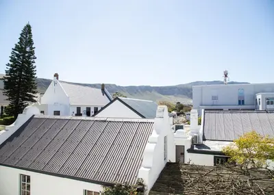 an aerial view of a city with white buildings at Marine Square Luxury Suites in Hermanus