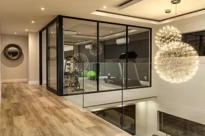 a display case in a room with glass at Villa de luxe in Franschhoek