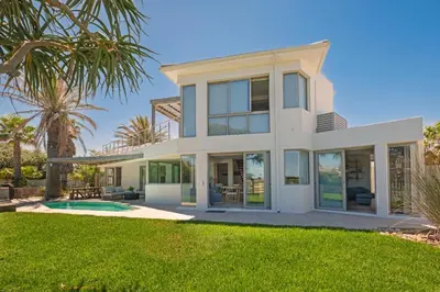 a large white house with a yard at Kite View Villa @2 in Cape Town