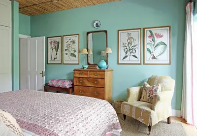 a bedroom with a bed and a dresser and a mirror at Tugela in Franschhoek