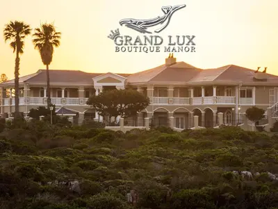 a large building with a sign that reads grand lux boulevard marker at Grand Lux Boutique Manor in Hermanus
