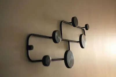 a pair of glasses hanging on a wall at Rose Gold @The Winchester in Cape Town