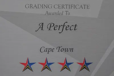 a picture of four stars with the words graded certificate awarded to a perfect cape town at A Perfect Self Catering in Wellington