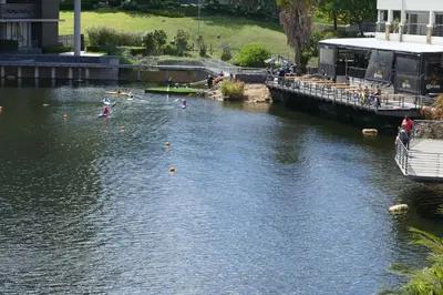 a group of people swimming in a river at Little Venice Self Catering in Bellville