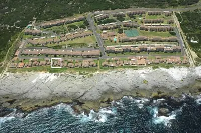 an aerial view of a resort near the ocean at Hermanus Beach Club - Le Maree House 18 in Hermanus