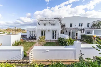 an image of a white house at Sunset Farm Stellenbosch in Stellenbosch