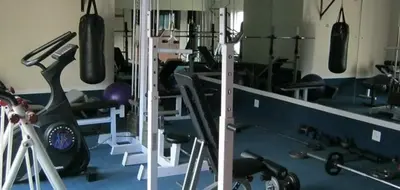 a gym with lots of exercise equipment in it at Hermanus Beach Club - St Tides House 19 in Hermanus