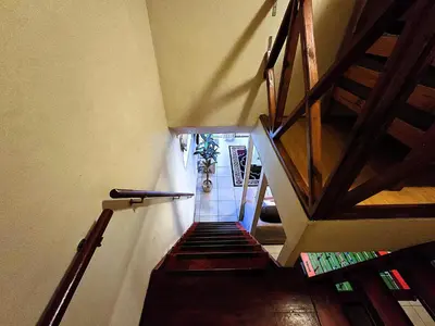 a view of a staircase in a house at Walters Lane Deluxe Garden Apartment 3 - No loadshedding in Cape Town
