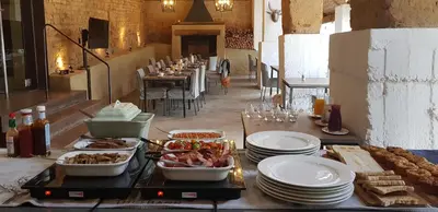 a table with food on it with plates and dishes at Diamant Estate in Paarl