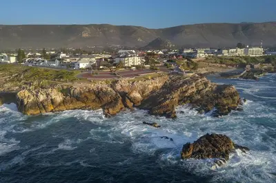 an aerial view of a rocky island in the ocean at Tuis en Tevrede - 2 Bedroom Flat in Hermanus