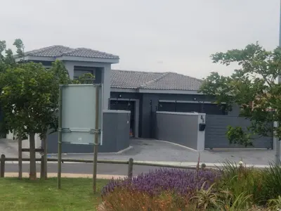 a house with a gate in front of it at Prince Olive in Cape Town