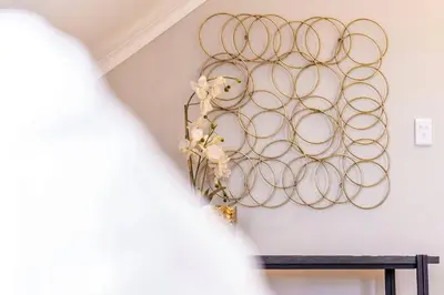 a chandelier hanging from a wall in a room at Val de Vine in Stellenbosch