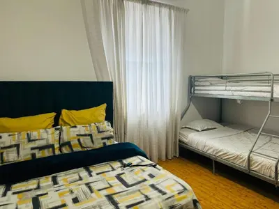 a bedroom with two bunk beds and a window at Peaceful getaway in Cape Town