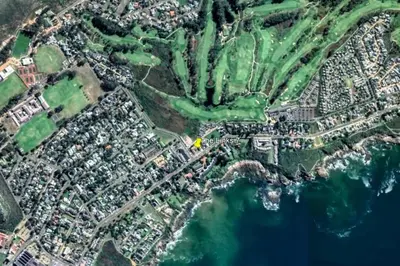 an aerial view of a city and the ocean at The Links by Top Destinations Rentals in Hermanus
