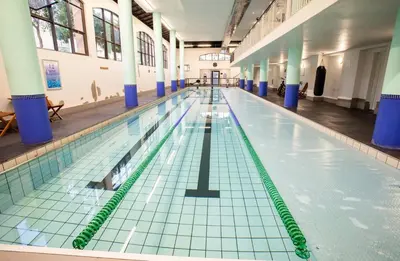 an empty swimming pool in a building at Century City Luxury 2 bedroom apartment in Cape Town in Cape Town