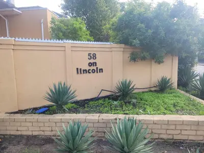 a wall with a sign that on indian at Zenith House Boston Self Catering Accomodation in Cape Town