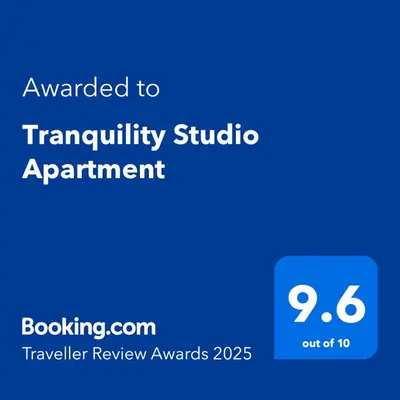 a blue sign that reads awarded to tranquility studio apartment at Tranquility Studio in Somerset West