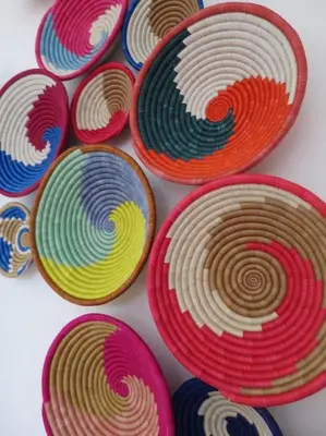 a group of colorful plates on a table at Seafront house with a view in Kleinmond