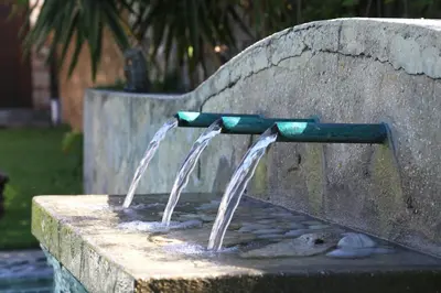a fountain with water coming out of it at Pat's Place in Hermanus