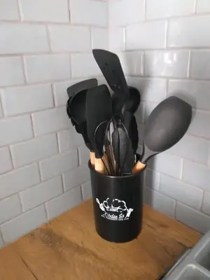 a container of cooking utensils sitting on a counter at Prince Alfreds in Caledon