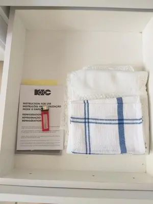 two towels and a book in a drawer at Prince Alfreds in Caledon