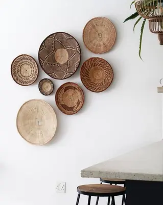 a group of wooden plates on a wall at Quiet hidden gem in historic Stellenbosch in Stellenbosch