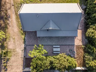an overhead view of a building with a roof at Avemore Winelands Home - wood fired hottub and full power back up in Stellenbosch