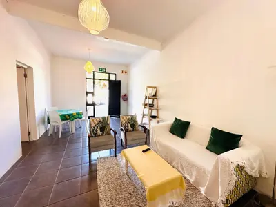 a living room with a couch and a table at 2-Bedroom Hermanus - Sleeps 4 - Near Sea in Hermanus