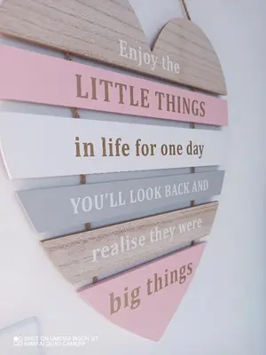a heart shaped sign with the words enjoy the little things in life for one day at Stay Palm 1 in Cape Town